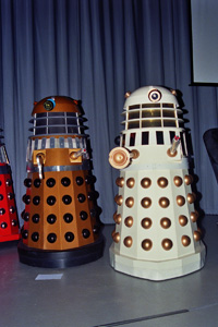 Front view gold and white daleks